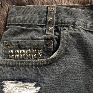Distressed LEVI cut off jean shorts.